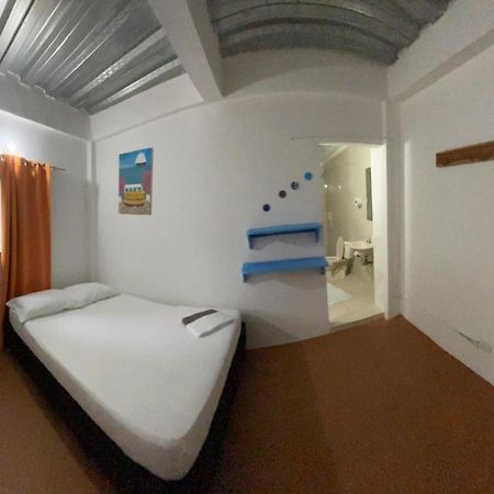 Hostal Paloma Cafe Palomino Bagian luar foto